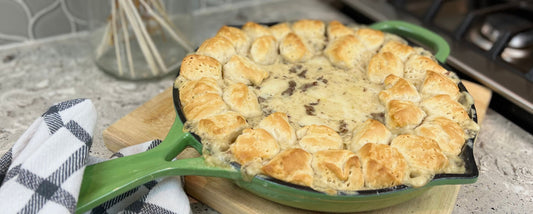 biscuits & gravy in green skillet