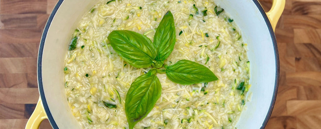 Squash risotto topped with basil