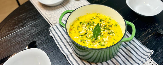 Corn Chowder in Green Dutch Oven on dinning table