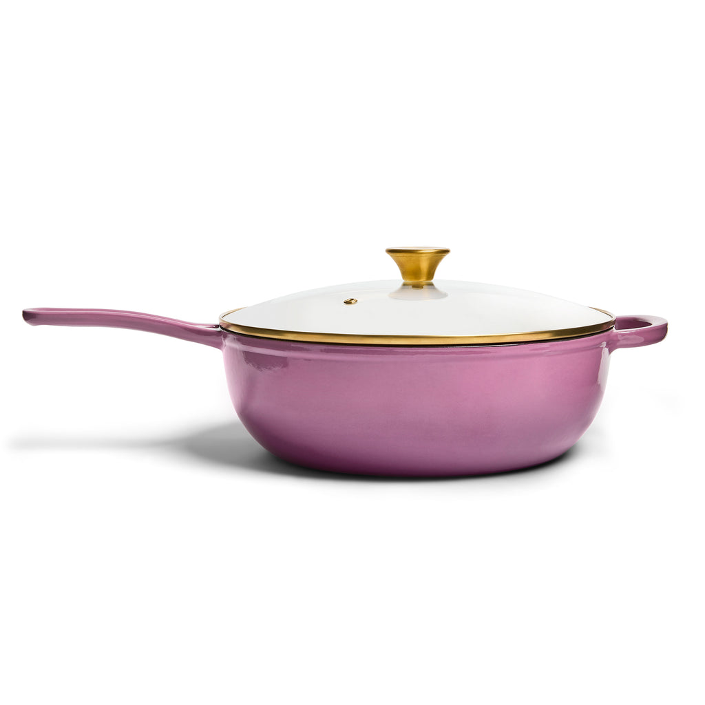 Purple cookware with gold accents on a white background